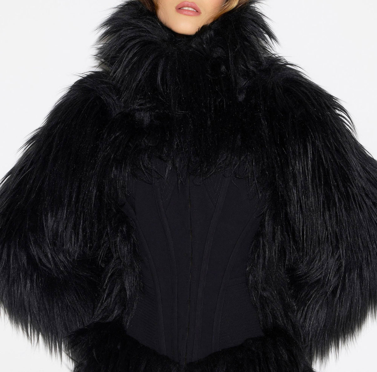 Cappotto effetto pelo con bustier