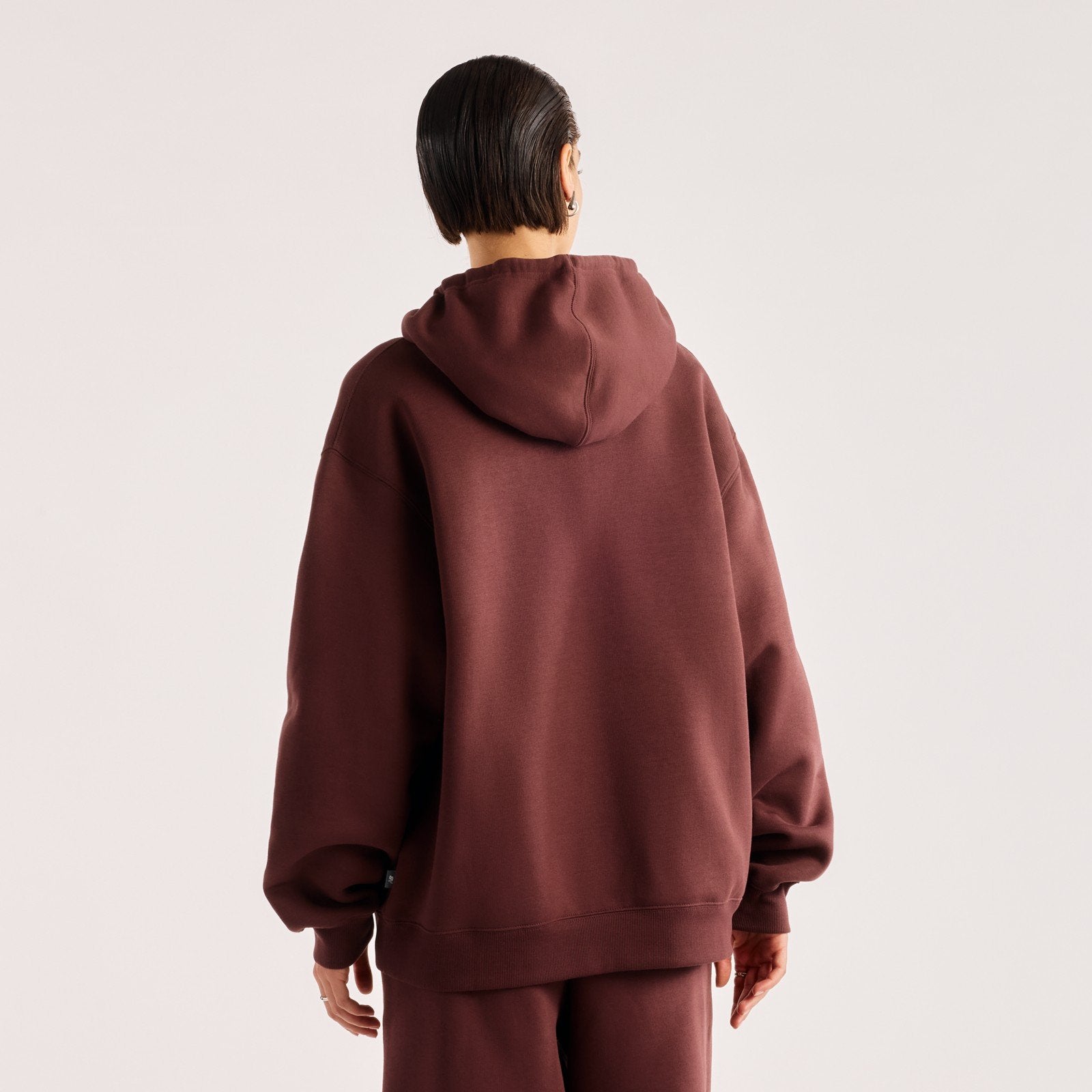 New Balance Felpa con Cappuccio Trackside Fleede Hoodie