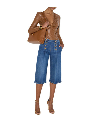 Jeans a zampa con taschini