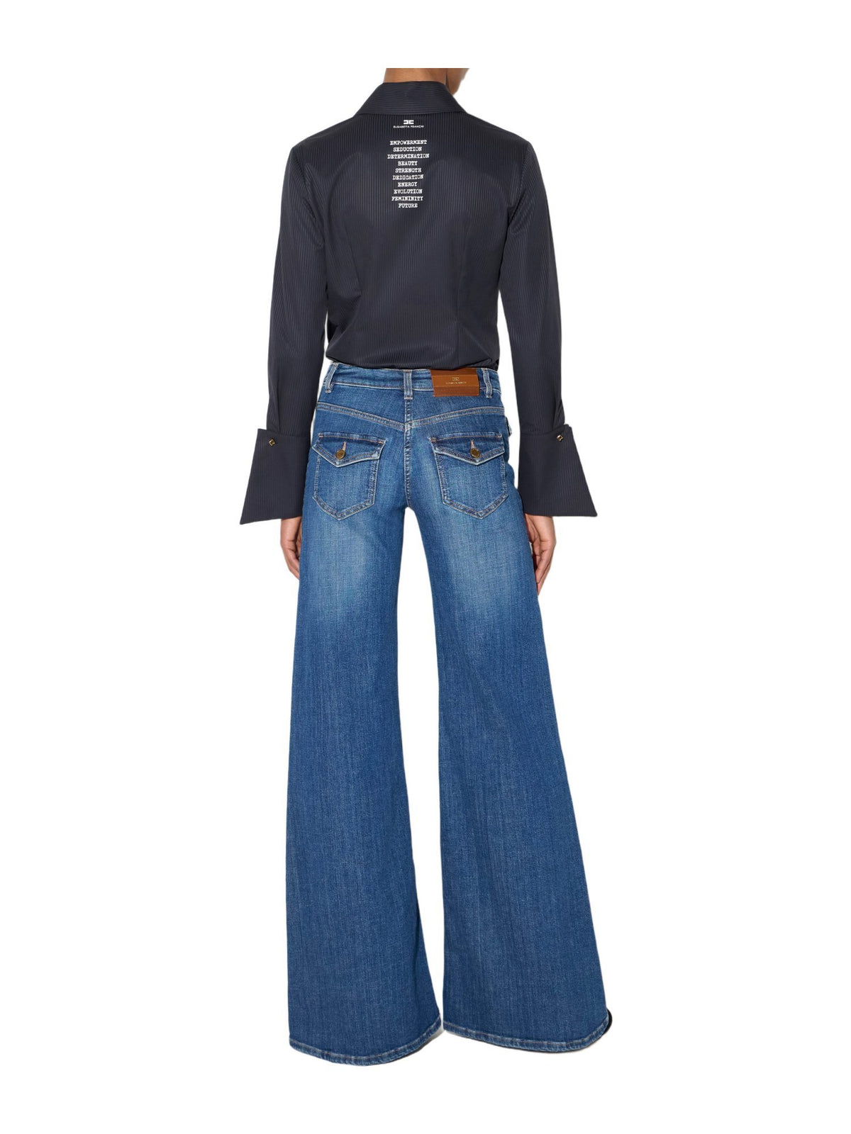 Jeans a zampa con taschini