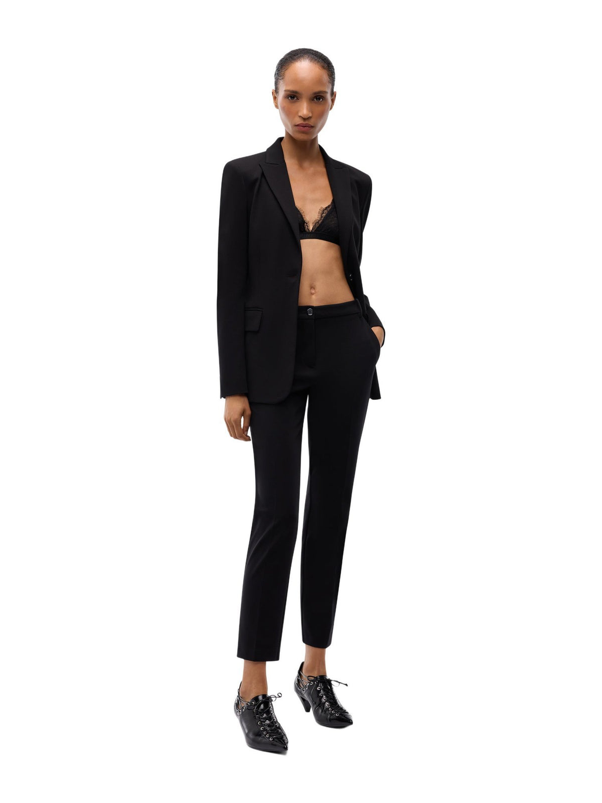 Pantalone slim fit bello con piega stirata