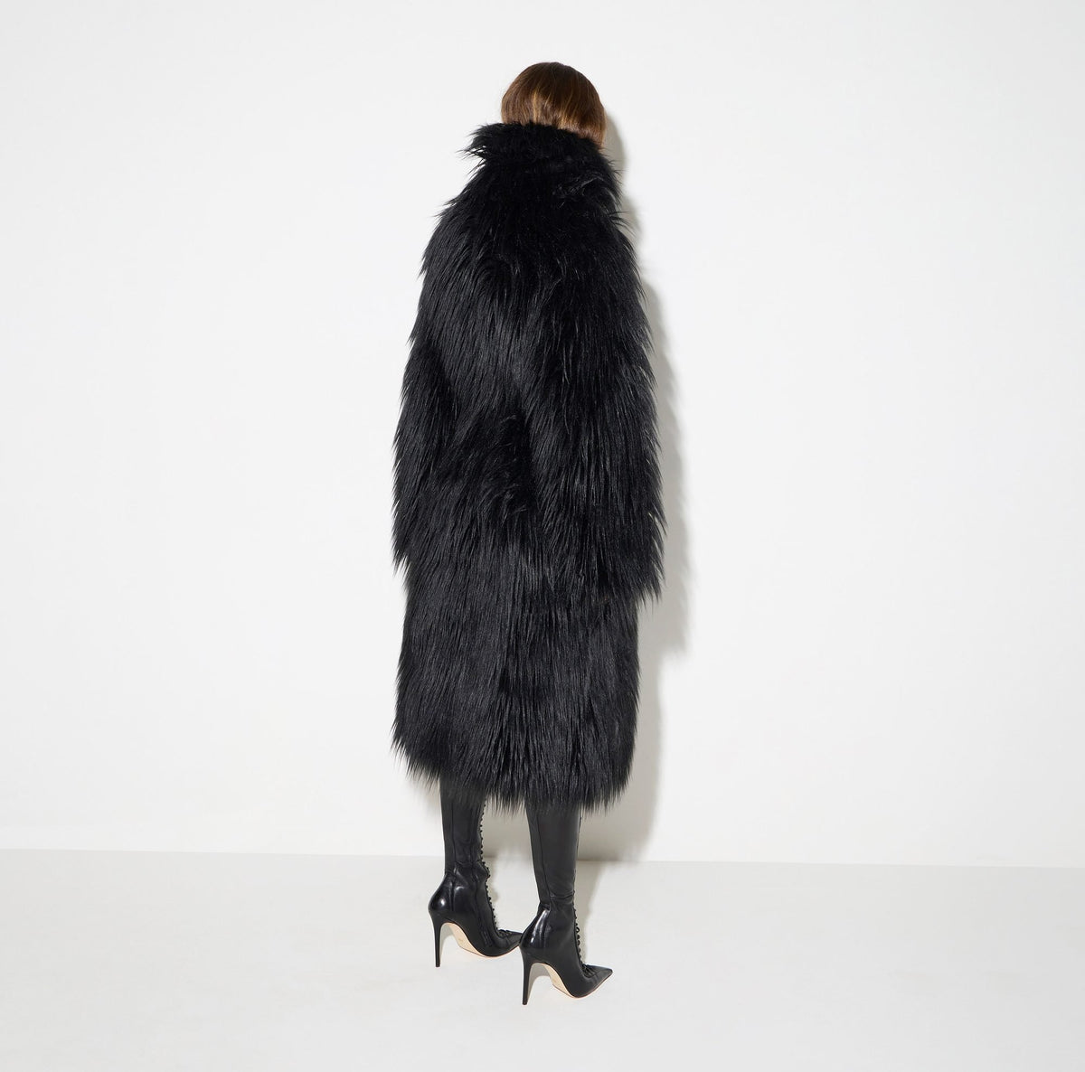 Cappotto effetto pelo con bustier
