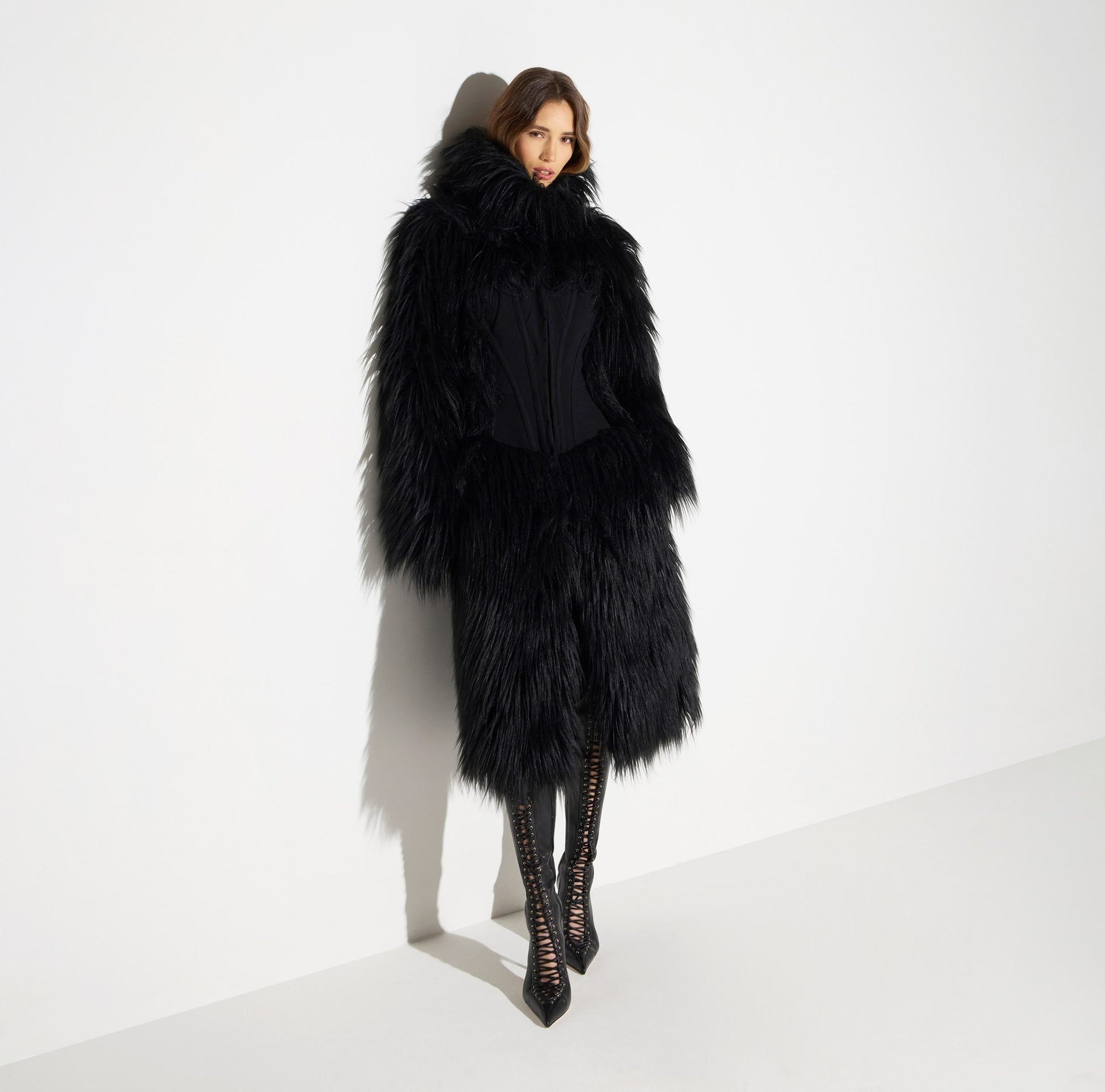 Cappotto effetto pelo con bustier