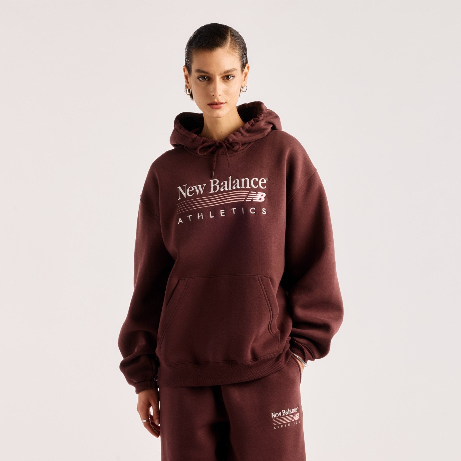 New Balance Felpa con Cappuccio Trackside Fleede Hoodie